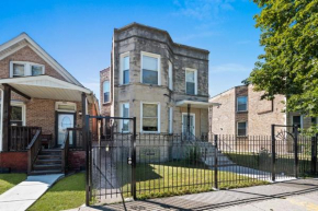 Newly rehabbed Greystone with 2 private apartments, backyard, garage, laundry, close to expressway
